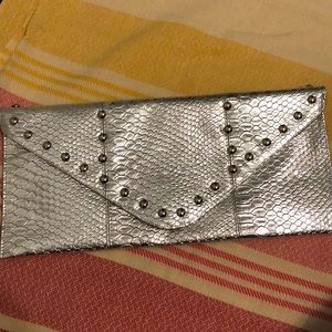 Silver clutch with silver studs